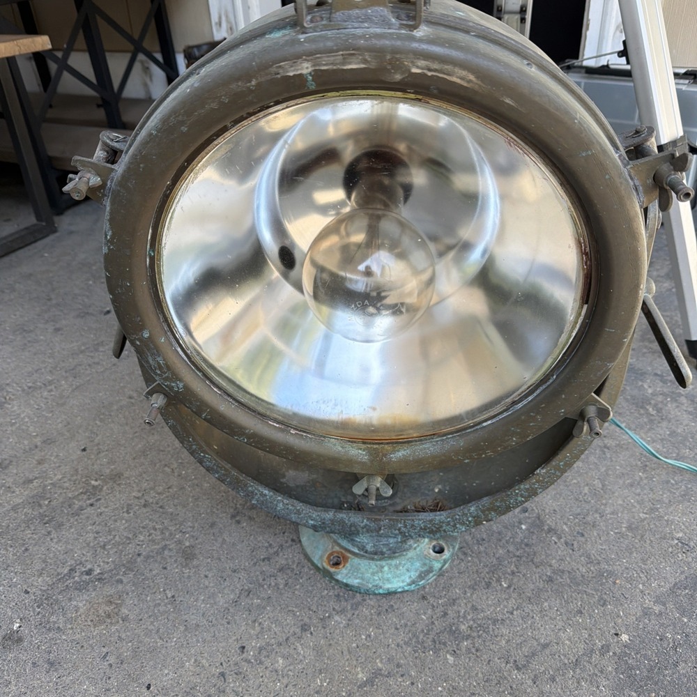 vintage metal marine spotlight closely resembling mid-20th-century naval Search